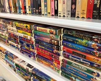 Disney, dvds, cds, vhs