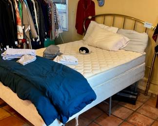 Double mattress on frame, headboard, clothing