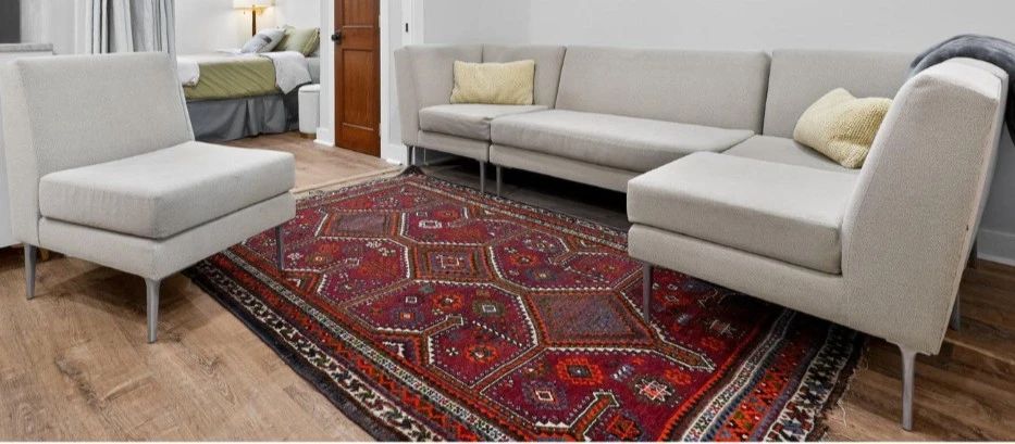 Sectional couch. Rug is sold 