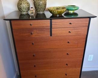 Contemporary chest of drawers and vintage pottery