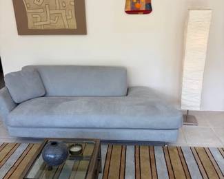 Contemporary sofa and metal and glass coffee table; handwoven vintage 6' x 12' Linda Belden rug