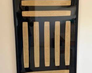 Framed Burmese palm leaf manuscripts