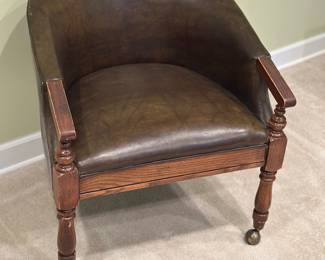Vintage leather tub chair with casters