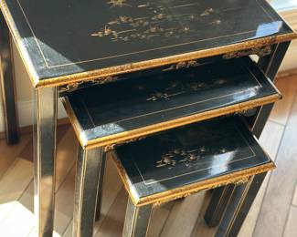 Three nesting black lacquer Asian tables