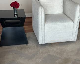 Pair of swivel accent chairs ( can be purchased but not picked up until after the house sells), pair of modern black end tables