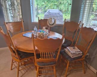 Beautiful Oak Round Clawfoot Table & 6Pressed Back Chairs and Large extra board