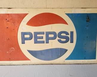 large metal PEPSI sign