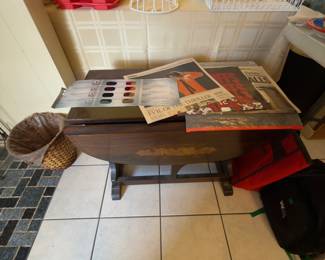 Cool antique folding table with collectible on top