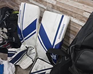 Warrior hockey gear- size youth medium-large