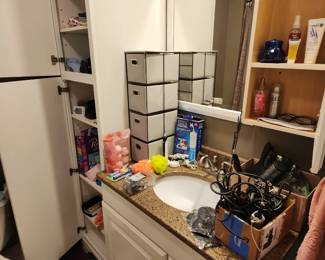 Bathroom Stuff including many hair trimmers (unknown if they work).  Towels, etc