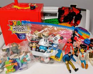 Ryan's Mystery Box with a bag of Ryan Toys and misc collectible toys figures