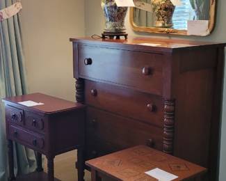 Empire style cherry chest from Davis Cabinet Co, gold leaf mirror, glass lamp, child's  game table, small red 3 drawer sidetable