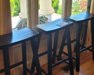 3 black saddle bar stools