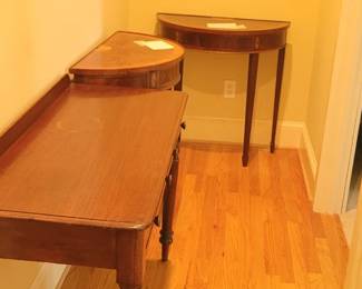 Mahogany half round inlayed console tables