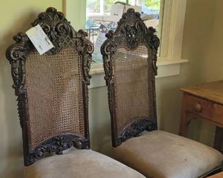 Pair of antique baroque style suede seat high back chairs