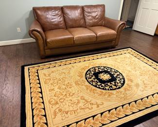 leather sofa, wool Safavieh rug