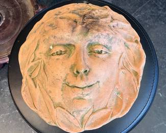 Terra cotta creepy face