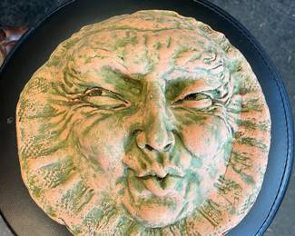 Terra cotta creepy face