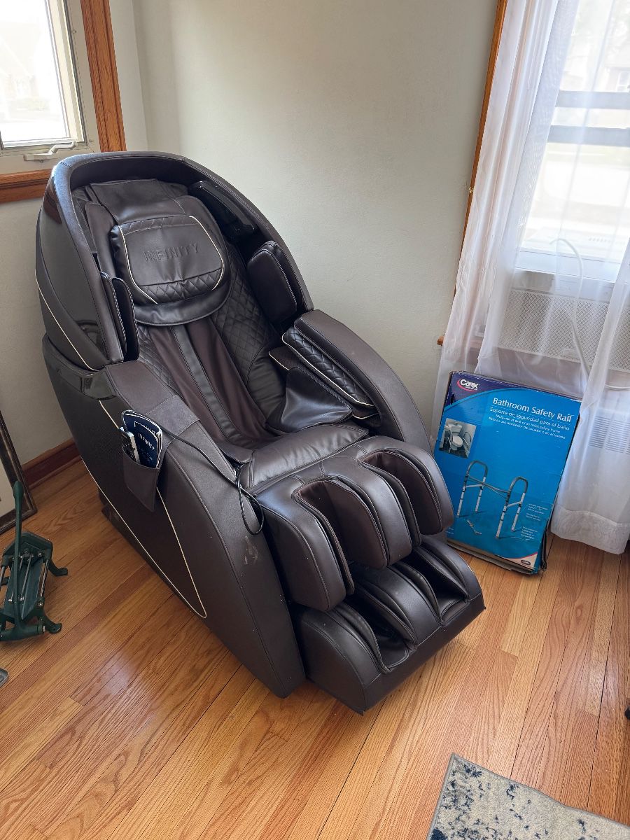 Infinity Palisade 4D Massage Chair bought new in 2022 for $9,000. (Bid item. Highest bid by 5pm wins.)