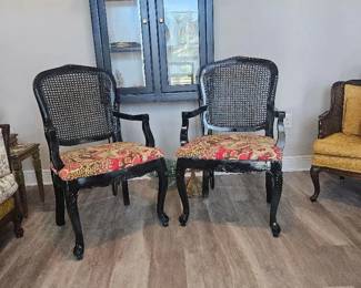 Black cane back chairs with upholstery seat