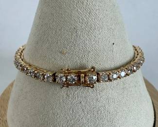Trio of Gold Plated Tennis Bracelets with Cubic Zirconium Settings  29.11g