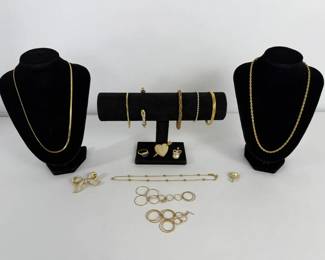 GoldPlated Jewelry Assortment with Chains, Bracelets, Rings, and Rhinestone Accents