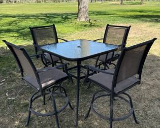 Outdoor Patio Table with Glass Top and Four Swivel Chairs