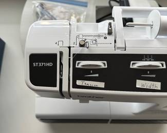 B39 - $75. Brother ST371HD Sewing Machine. Has power cord, pedal and original box. 