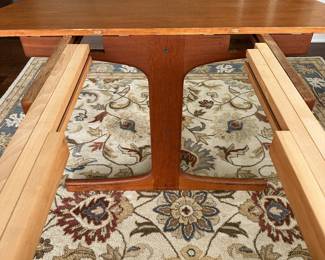 B12 - $600. Teak Dining Table with 2 leaves. Table is 42" round x 29.5" tall. 2 - 20" leaves included. 1 leaf needs refinishing (if you want - just a dark heat spot) 