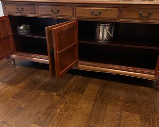B25 - $350. Solid Wood Sideboard. Measures 6’ x 18” deep x 33” tall. (Doors are a little sticky but absolutely still work as it and useable!) One darker spot on the top but overall very good condition!