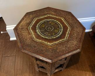 B29 - $225. Moroccan Style Table with Inlay. One lower panel is missing a chunk, otherwise good condition. 