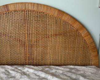 B11 - $250. Wicker Headboard used as a day bed. Twin size mattress with pop up trundle that makes it king sized. 