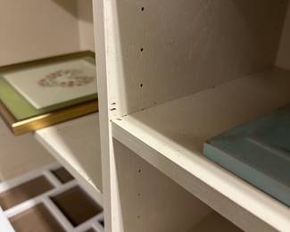 B79 - $30. Bookcase with glass top. 1 shelf is adjustable other shelves are fixed. Measures 48" x 12" x 29.5" tall. 