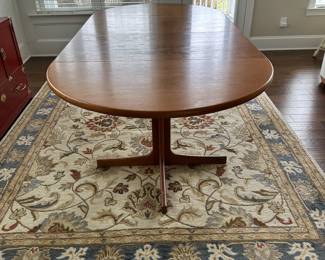 B12 - $600. Teak Dining Table with 2 leaves. Table is 42" round x 29.5" tall. 2 - 20" leaves included. 1 leaf needs refinishing (if you want - just a dark heat spot) 