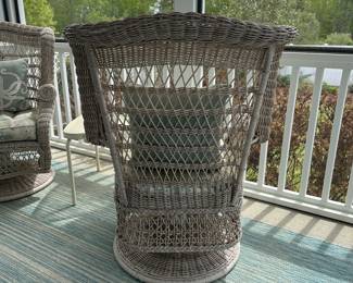 B14 - $140. Pair of Swivel, Bouncy Chairs. Plastic Wicker Material. Measures 31" wide x 42" tall. 
