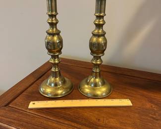 B27 - $35. PAIR of Brass Candlesticks. Measures 12” tall. 
