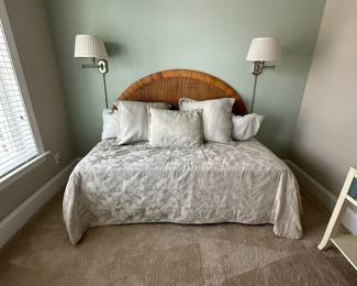 B11 - $250. Wicker Headboard used as a day bed. Twin size mattress with pop up trundle that makes it king sized. 
