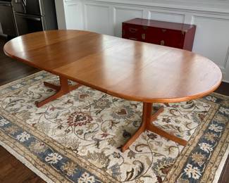 B12 - $600. Teak Dining Table with 2 leaves. Table is 42" round x 29.5" tall. 2 - 20" leaves included. 1 leaf needs refinishing (if you want - just a dark heat spot) 