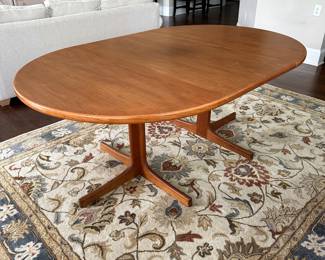 B12 - $600. Teak Dining Table with 2 leaves. Table is 42" round x 29.5" tall. 2 - 20" leaves included. 1 leaf needs refinishing (if you want - just a dark heat spot) 