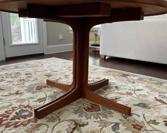 B12 - $600. Teak Dining Table with 2 leaves. Table is 42" round x 29.5" tall. 2 - 20" leaves included. 1 leaf needs refinishing (if you want - just a dark heat spot) 