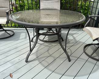 B19 - $50. 42" round Glass Top Patio Table. (Chairs are not useable.) Very minor rust spots but still sturdy and useable!