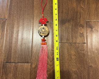 B47 - $15. Tagua Nut Tassel. 