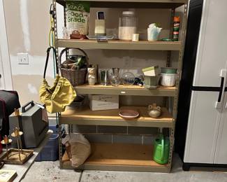 B95 - $50 Garage Shelving Unit. Very good garage condition!
