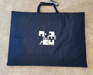 B45 - $25. La Vie Vert Puzzle Board with Padded Cover. Looks brand new with tags. 