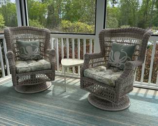 B14 - $140. Pair of Swivel, Bouncy Chairs. Plastic Wicker Material. Measures 31" wide x 42" tall. 