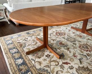 B12 - $600. Teak Dining Table with 2 leaves. Table is 42" round x 29.5" tall. 2 - 20" leaves included. 1 leaf needs refinishing (if you want - just a dark heat spot) 