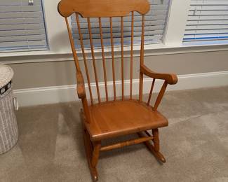 B73 - $30. Wooden Rocking Chair. It looks like it was on a screened in porch and has a few weathered spots, mostly on the back. Still sturdy. 