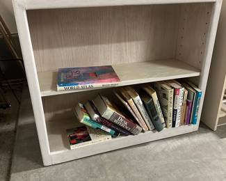 B77 - $20. Small Bookcase with adjustable shelves. Measures 36" x 12" x 30" tall. 