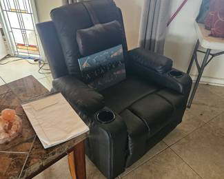 Most of the living room furniture is practically brand new he bought it several months before he passed away. This reclining chair has heat and massage. $150