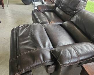 This leather double recliner is a wallhugger. Meaning that it does not have to be pushed away from the wall to fully recline very good shape has the distressed leather style $500r style
